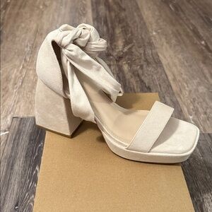 Cream Block Heel Sandals with criss cross tie up. Size 5 1/2.